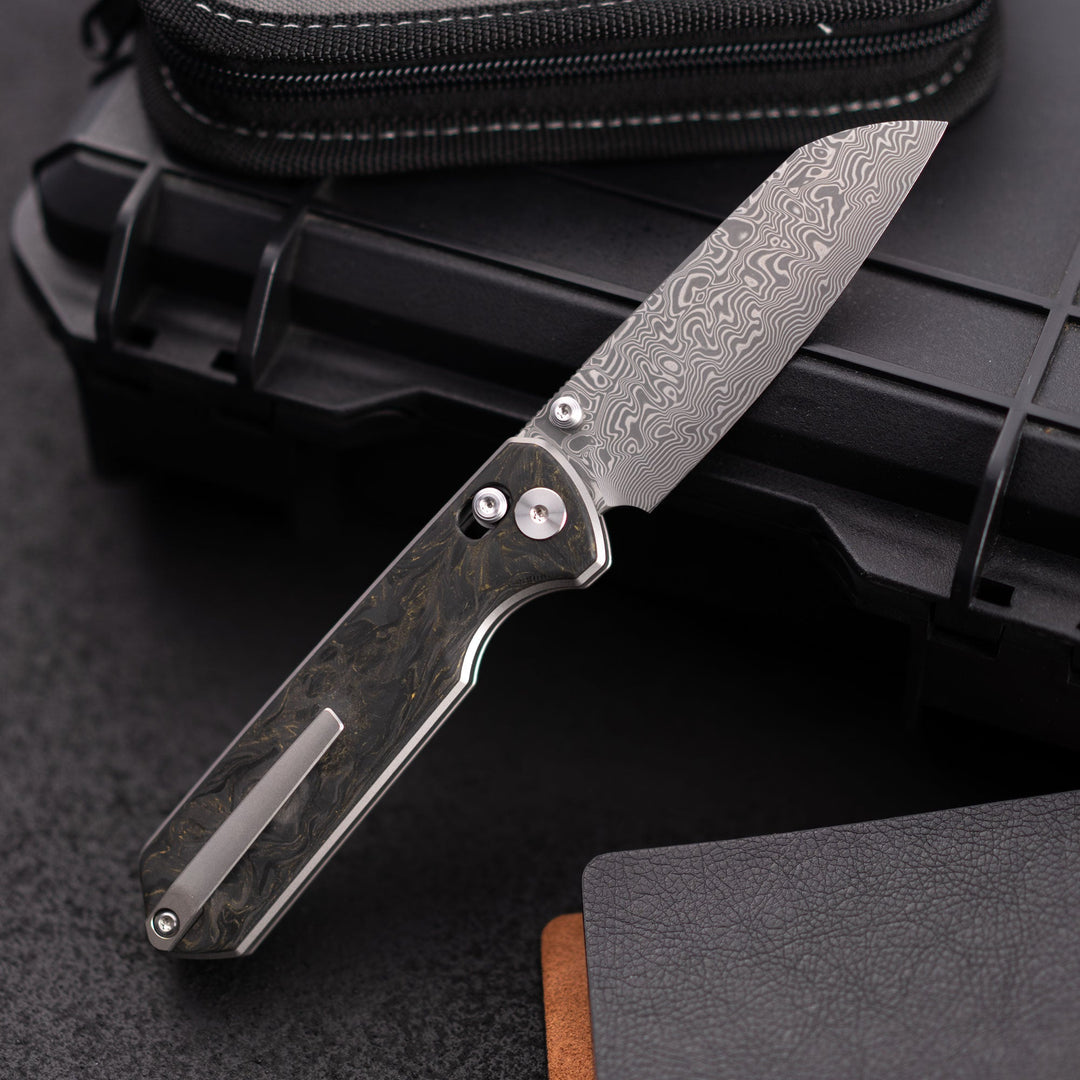 Imperial Penguin M060 Damascus steel cross bar lock thumb stud deployment