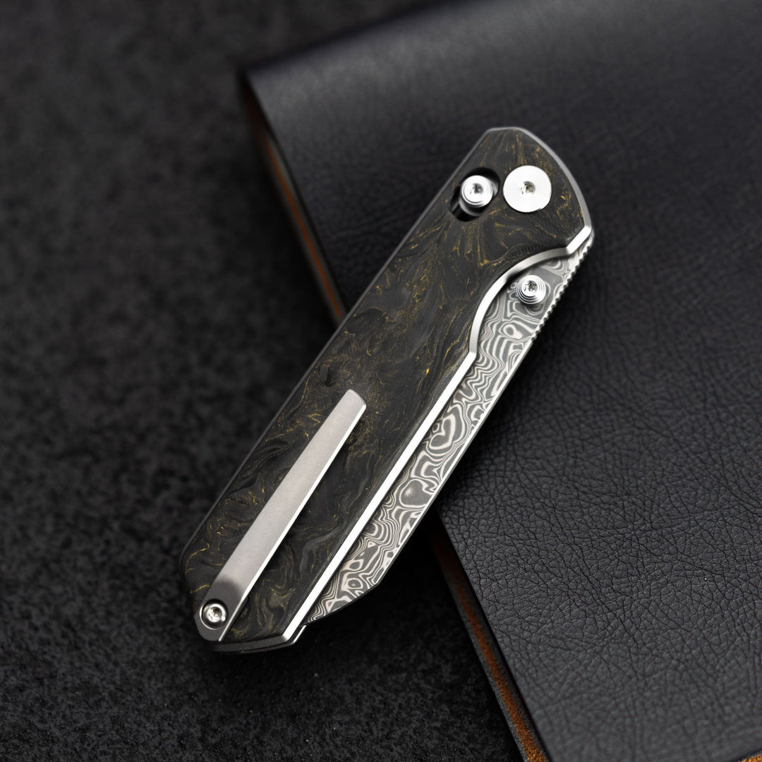Imperial Penguin M060 Damascus steel cross bar lock thumb stud deployment