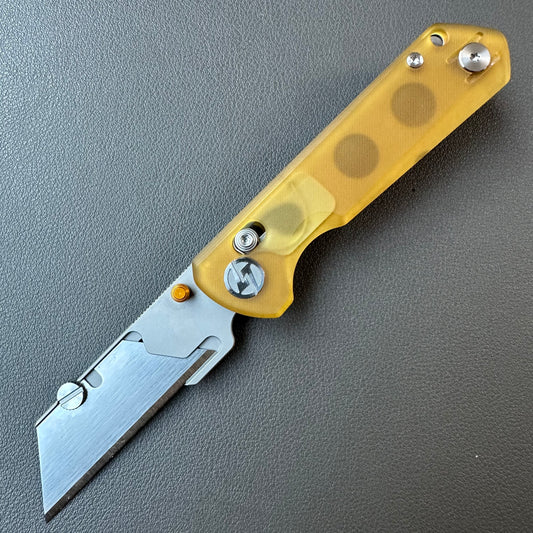 Olitans utility pocket knife cross bar lock Ultem scales