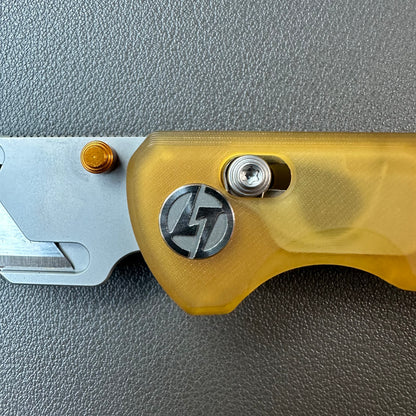 Olitans utility pocket knife cross bar lock Ultem scales