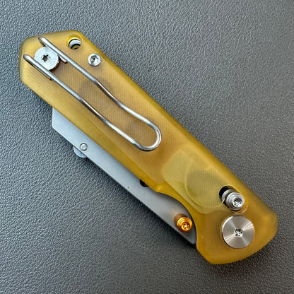 Olitans utility pocket knife cross bar lock Ultem scales