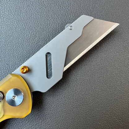 Olitans utility pocket knife cross bar lock Ultem scales